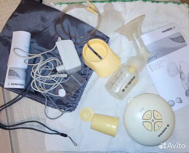 Молокоотсос medela swing