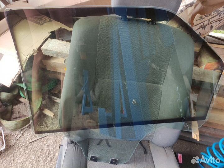 Стекло двери заднее правое Renault Logan 1 седан