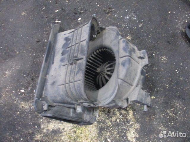 Моторчик печки в корпусе Mercedes-Benz A0038300108