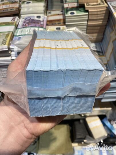 Вакуумная упаковка долларов нового образца