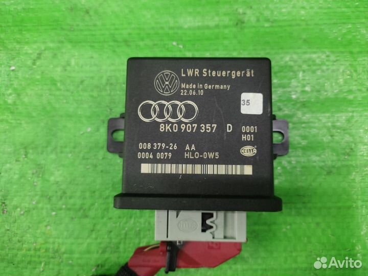 Блок управления корректором фар 8K0907357D Audi