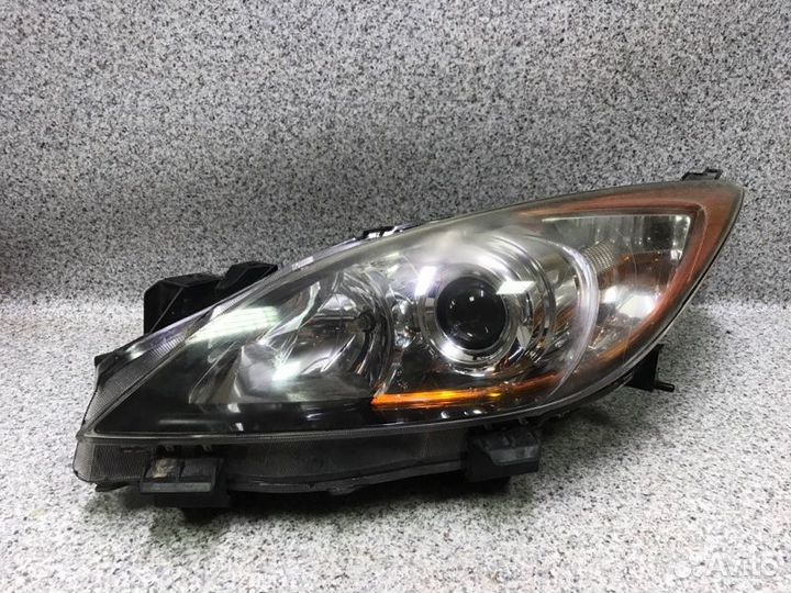 Фара левая Mazda 3 BL 2010
