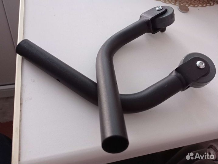 Антиопрокидыватель для инвалидной коляски