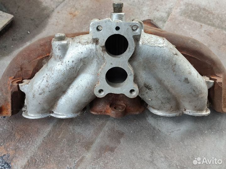 Коллектор впуской выпускной газ-24