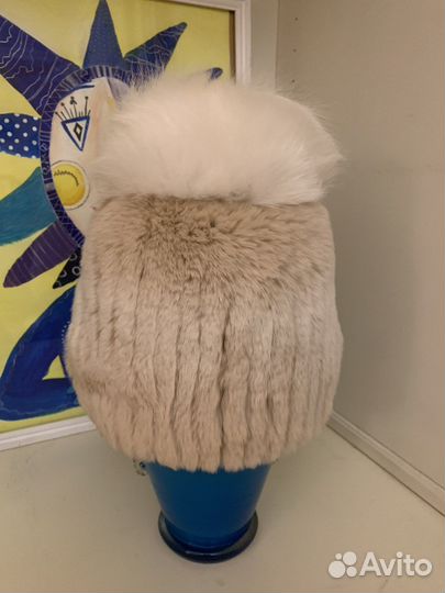 Женские меховые и вязанные шапки