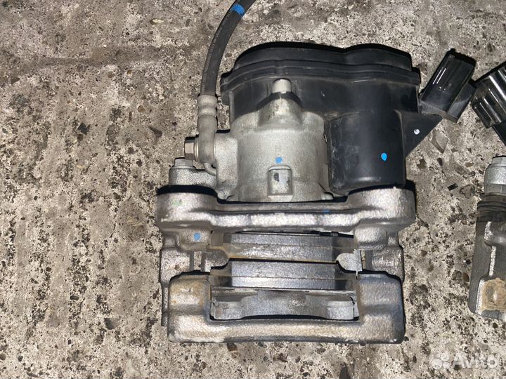 Суппорт тормозной задний левый правый Mazda 3-6