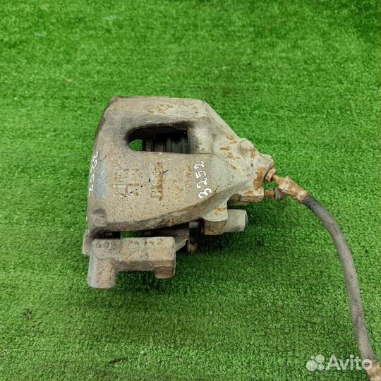 Суппорт тормозной передний левый Mazda 3 BK 2005