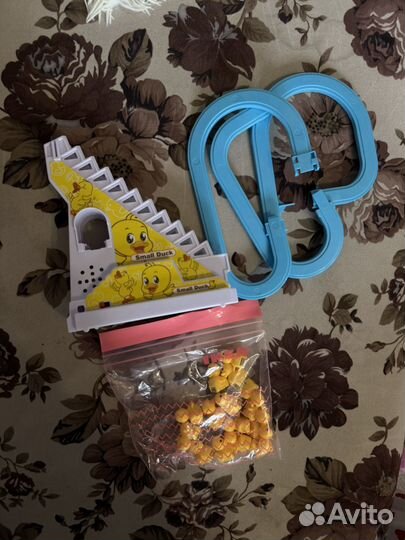 Игрушка уточки