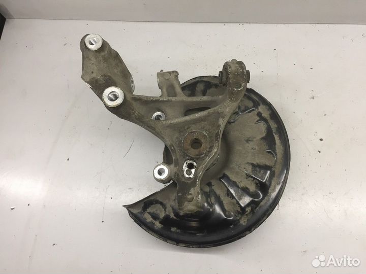 Кулак поворотный задний левый (Volkswagen Passat)