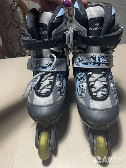 Роликовые коньки