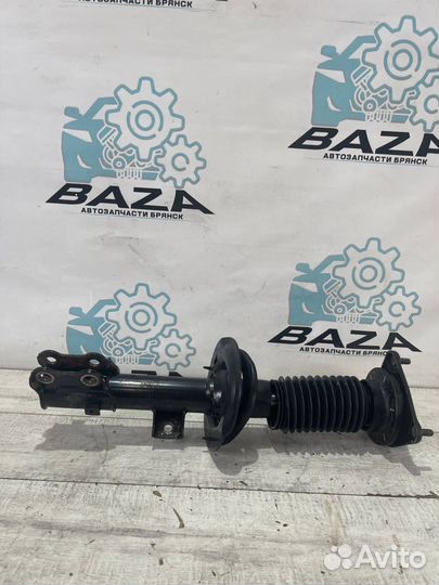 Стойка амортизатора передняя левая Kia Cerato 3