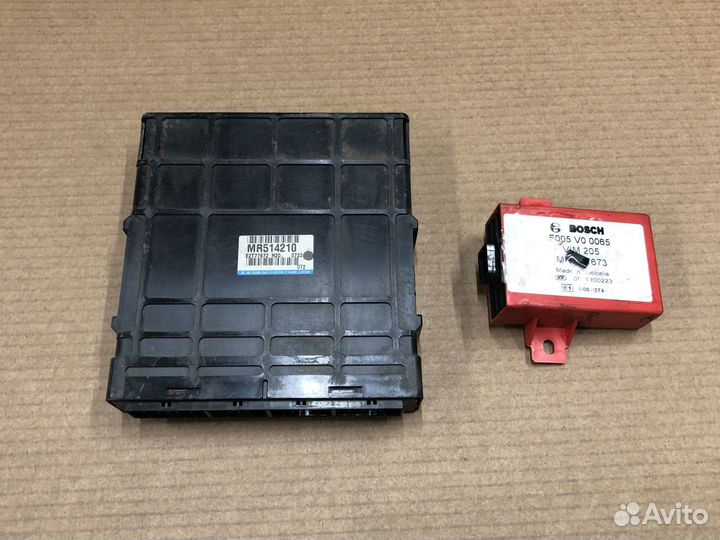 Эбу MR514210 с иммобилайзером и чипом Каризма