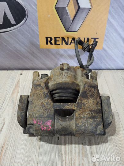 Суппорт тормозной перед Renault scenic 3 Лев