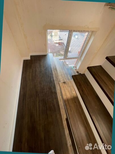 Облицовка каркаса лестницы деревом