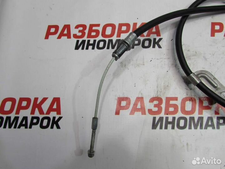 Трос стояночного тормоза центральный для Nissan Mu