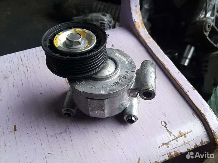 Натяжитель ремня Форд 1.8i qqdb