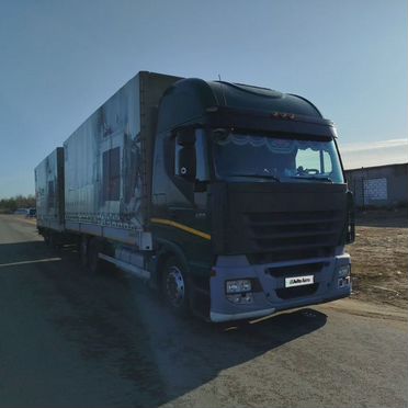 Тентованный грузовик 100 м³ IVECO Stralis, 2012