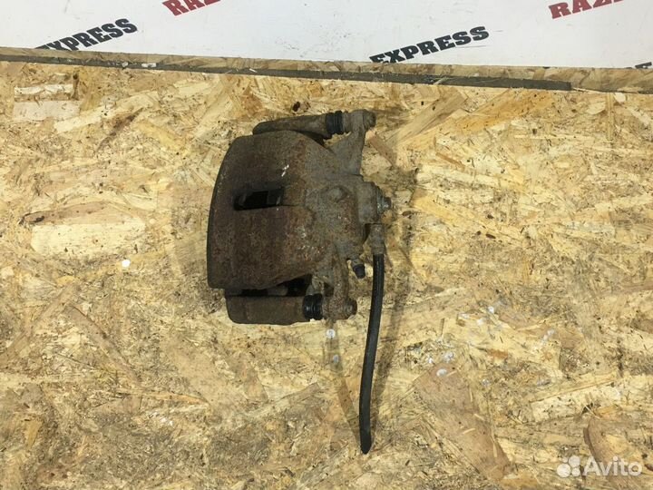 Суппорт тормозной передний правый Skoda Octavia A7