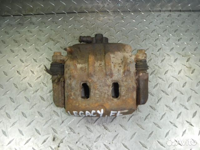 Суппорт тормозной передний левый Subaru Legacy