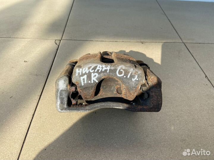 Тормозной суппорт передний правый Nissan Almera G1