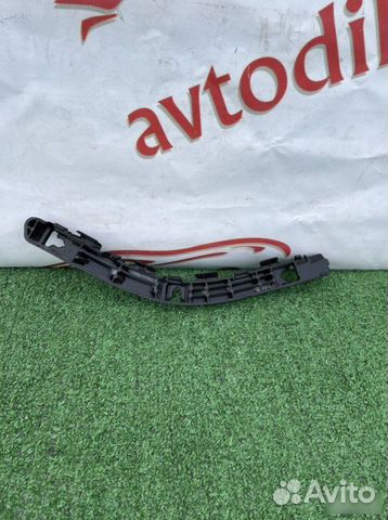 Кронштейн бампера задний левый Kia Sportage SL