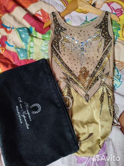 Купальник гимнастический золотой