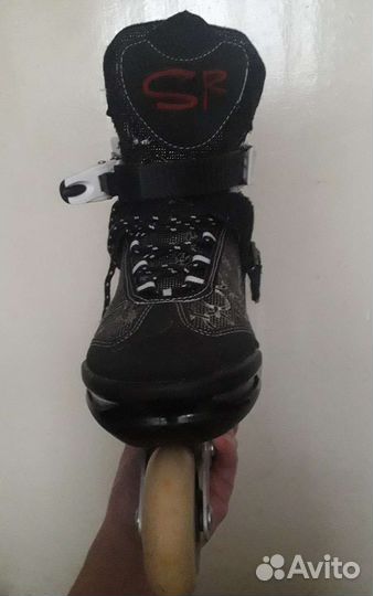 Роликовые коньки