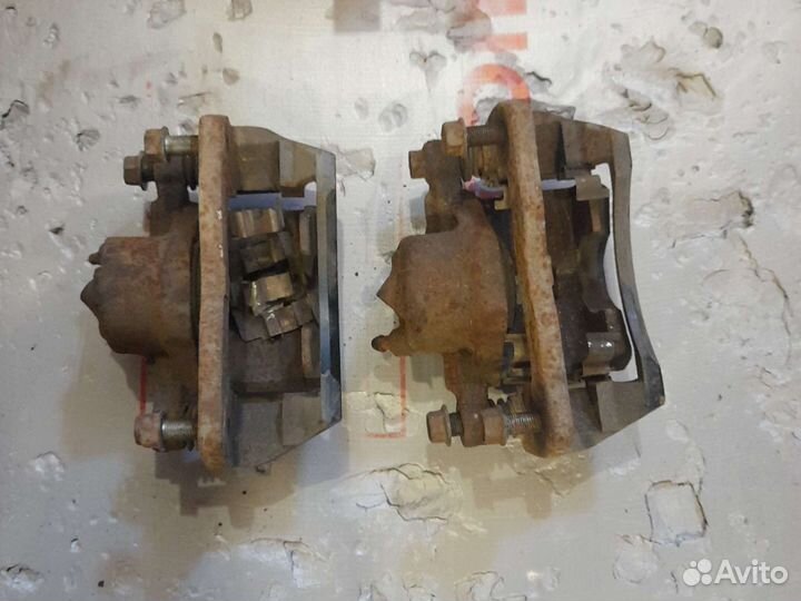 Супорт правый. передний Кия spectra