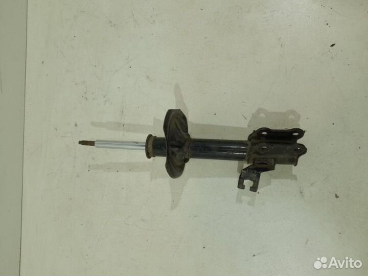 Амортизатор передний левый Nissan Almera Classic