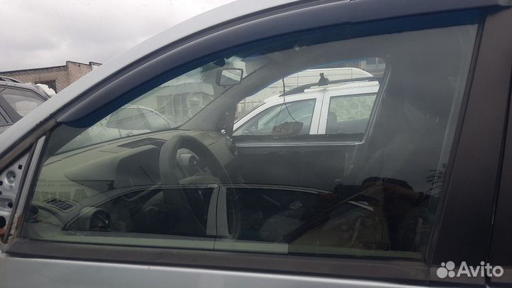 Стекло двери переднее левое Ford Fusion