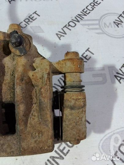 Суппорт тормозной задний Kia Cerato 1