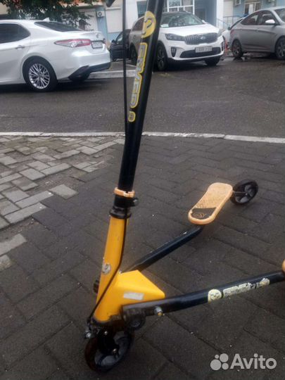 Инерционный самокат