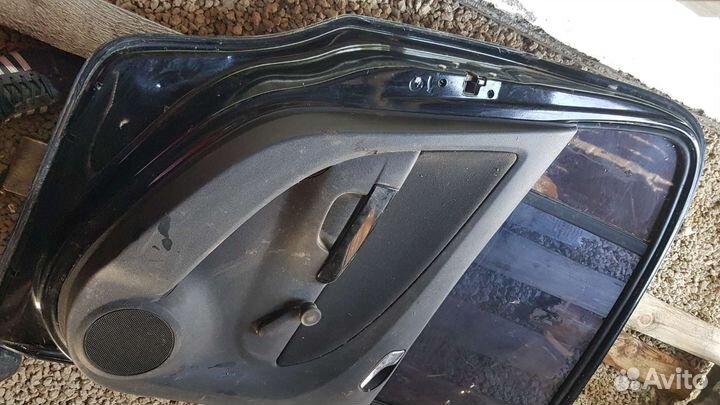 Дверь задняя левая Opel Corsa D