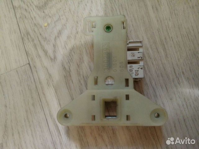 Замок блокировки дверцы стиральной машинки