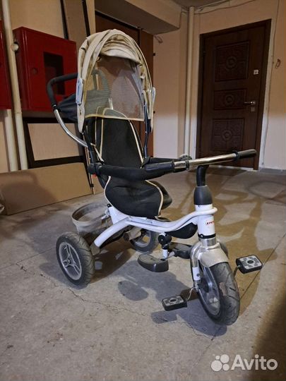 Трехколесный велосипед с ручкой