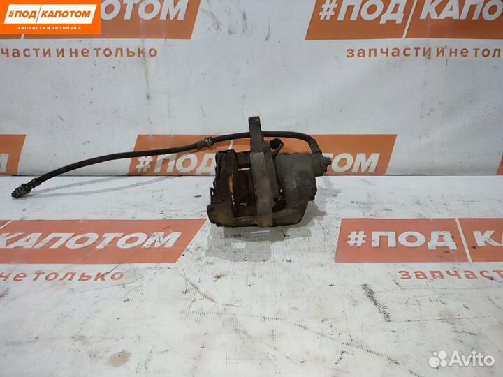 Суппорт тормозной передний левый Volkswagen Tiguan