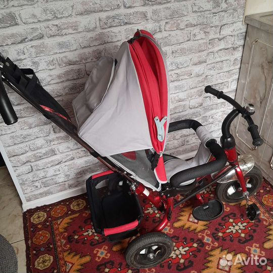 Трехколесный велосипед с ручкой