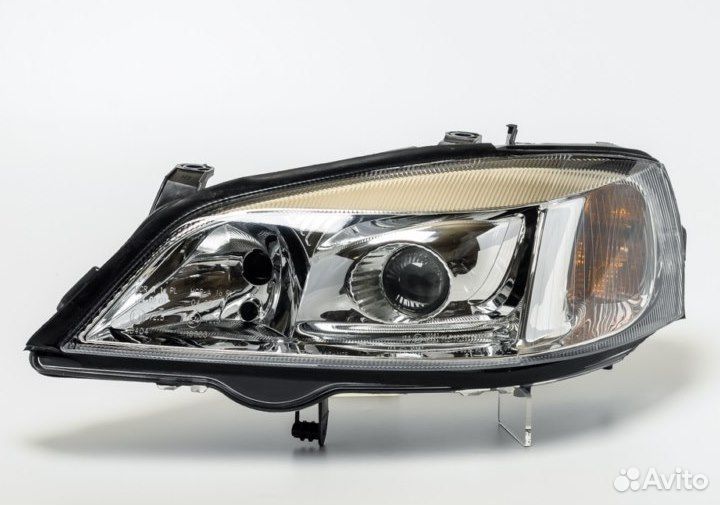 Фара левая Opel Astra G