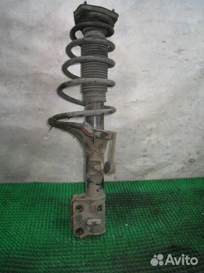 Стойка амортизатора задняя левая Hyundai Tucson