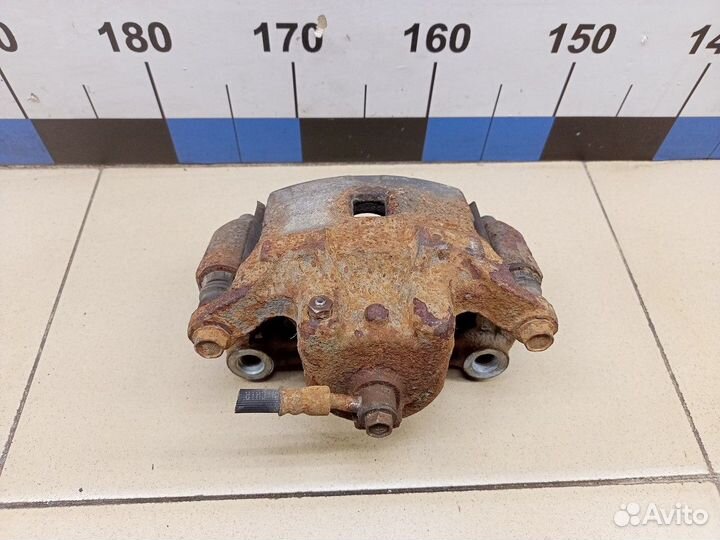 Суппорт передний левый Juke (F15) 2011