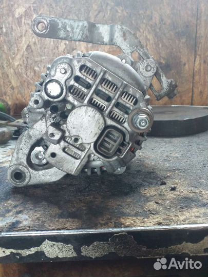 Генератор на mitsubishi lancer 7