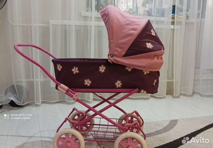 Игрушечная коляска для кукол