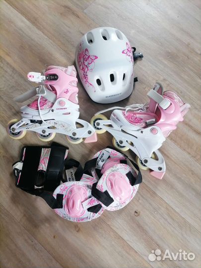 Роликовые коньки