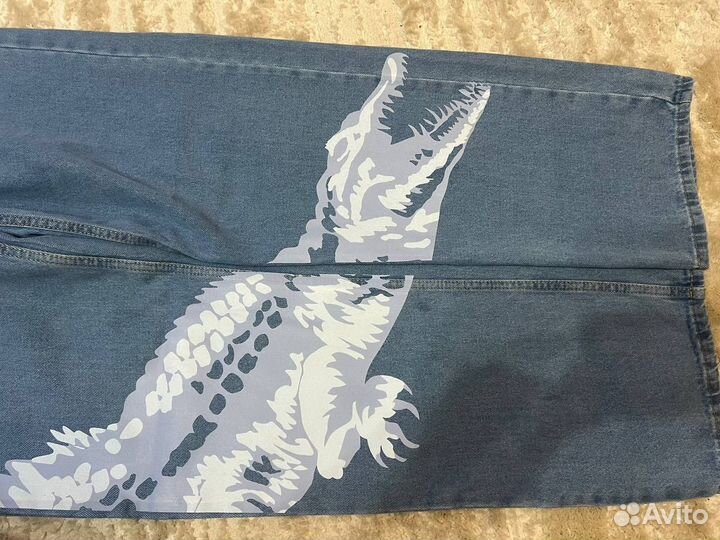 Джинсы lacoste