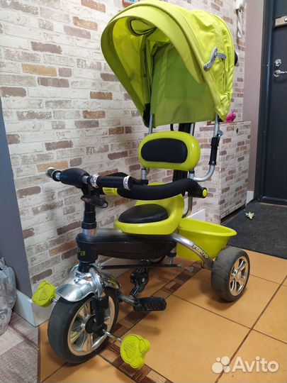 Трехколесный велосипед с ручкой