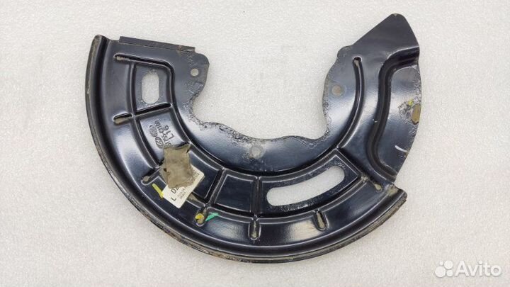 Пыльник тормозного диска передний левый Kia Optima