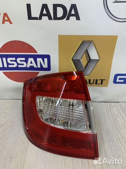 Фонарь задний Skoda rapid Лев