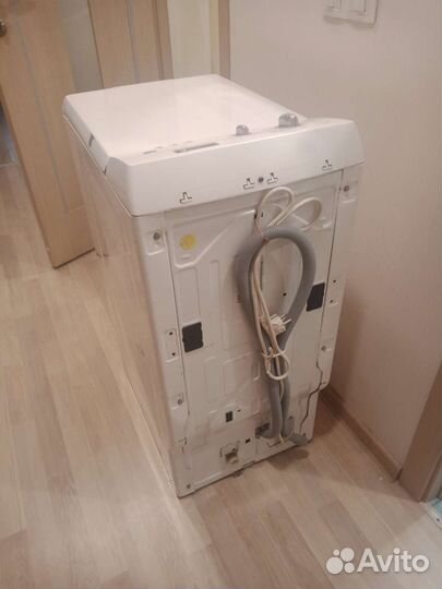 Стиральная машина с вертикальной загрузкой
