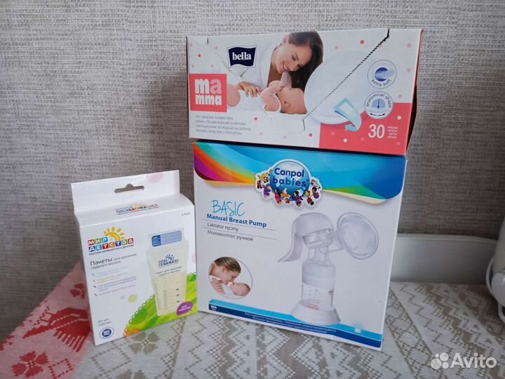 Молокоотсос ручной + пакеты для молока + владыши