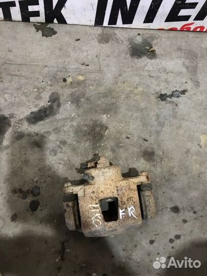 Суппорт передний правый Daewoo Nexia